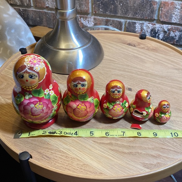 Russian Wooden Kachina Stacking dolls. Four stack in main doll. One flaw shown - Picture 10 of 11